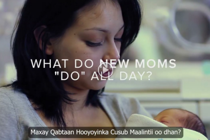 A video still with overlaid text that reads "What do new moms do all day?"